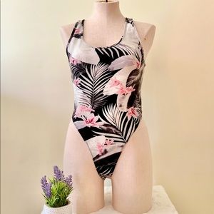 Victoria Sport hi cut body suit